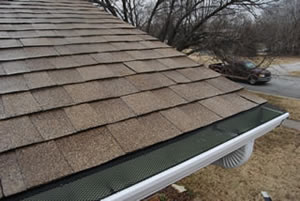 E-Z-Under gutter screens stand up under heavy debris and snow