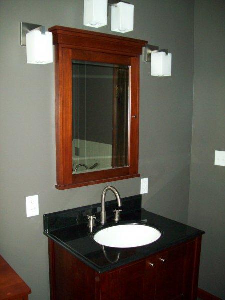 New vanity with solid surface countertop
